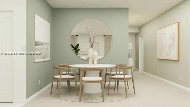 This rendering shows a dining area with a round table, four chairs, and a large mirror — 2782 Pioneer Trail, Winter Haven FL 33839, WINTER HAVEN, FL
