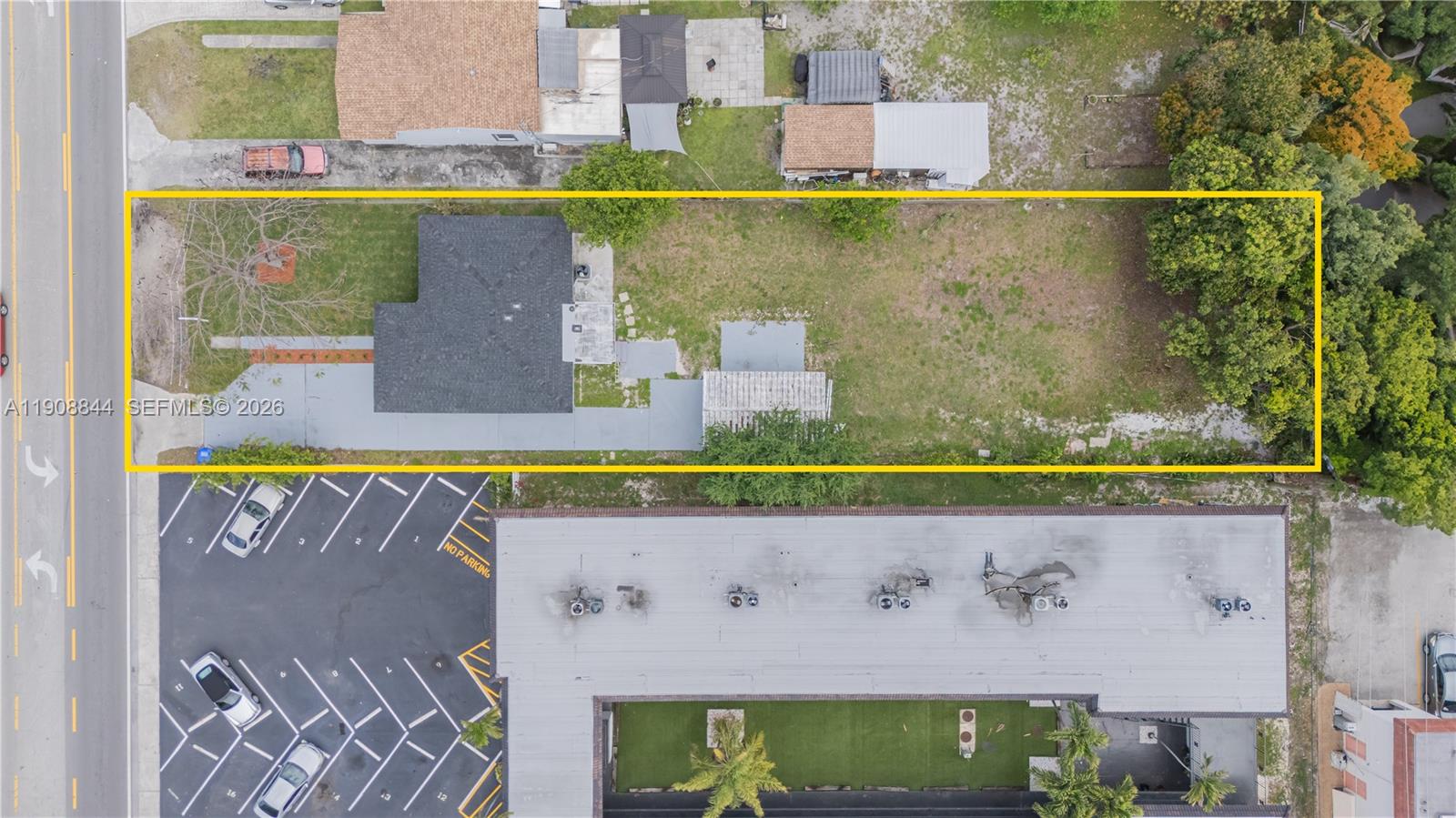 An aerial view shows a rectangular residential lot with a house and a large yard — 2462 Johnson St, Hollywood FL 33020, HOLLYWOOD, FL