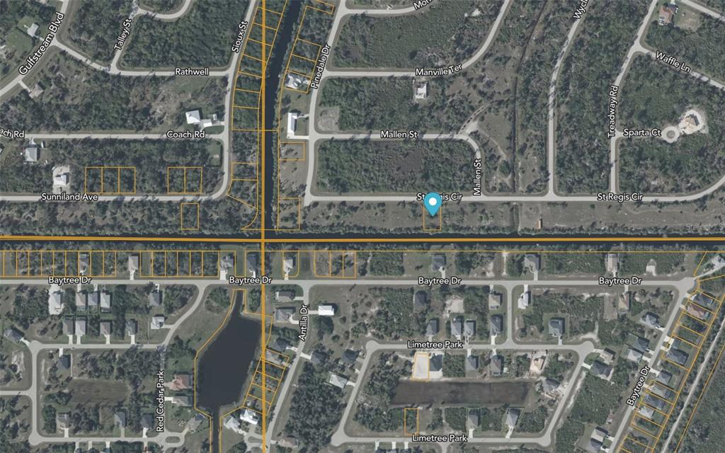 This is an aerial map showing a vacant lot marked with a blue pin — 7786 ST REGIS CIRCLE, PORT CHARLOTTE, FL