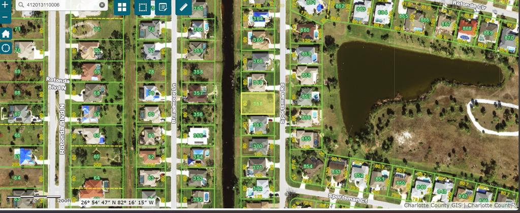 This is a satellite map view showing residential lots and a canal in a neighborhood — 11 SPORTSMAN ROAD, ROTONDA WEST, FL
