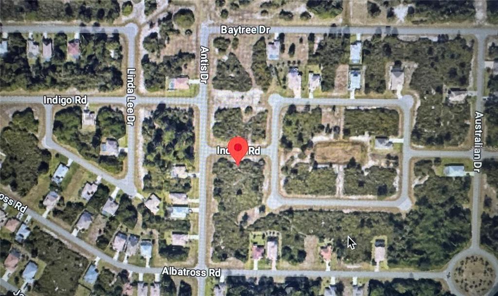 This is an aerial map view of a residential neighborhood with undeveloped land — 105 GREEN OAK DRIVE, ROTONDA WEST, FL