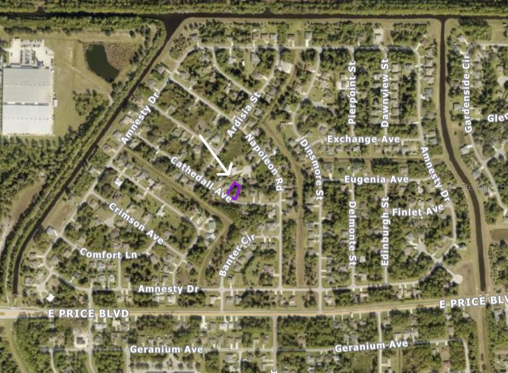 This is an aerial map showing a residential neighborhood with a highlighted property lot — CATHEDALL AVENUE, NORTH PORT, FL