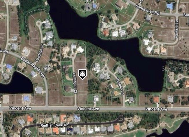 This is an aerial map view of a residential neighborhood with a vacant lot highlighted — 17512 CUILLAGAN COURT, PUNTA GORDA, FL