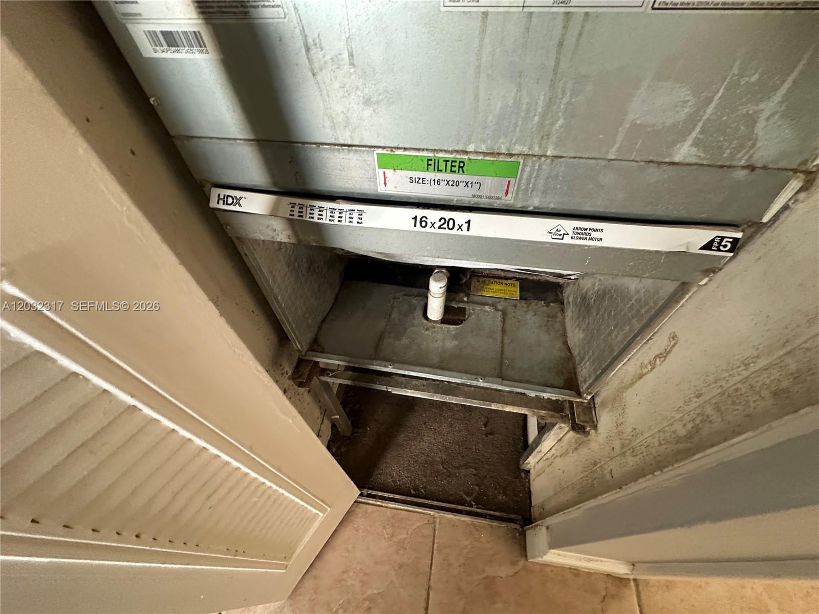 A close-up view shows an HVAC air filter slot with a 16x20x1 filter installed — 2008 JACKSON ST # 7, Hollywood FL 33020, HOLLYWOOD, FL
