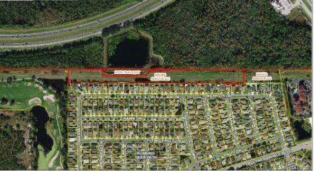 This is an aerial map showing a rectangular parcel of land adjacent to a residential neighborhood — POLYNESIAN ISLE BOULEVARD, KISSIMMEE, FL