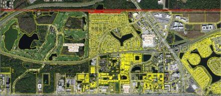 This is an aerial map showing property boundaries highlighted in yellow over a residential area — POLYNESIAN ISLE BOULEVARD, KISSIMMEE, FL