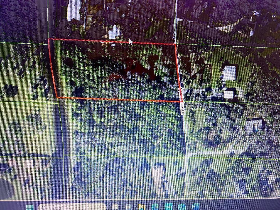 This is an aerial map showing a rectangular parcel of land outlined in red — 2743 Prarieview Drive, Loxahatchee FL 33470, LOXAHATCHEE, FL