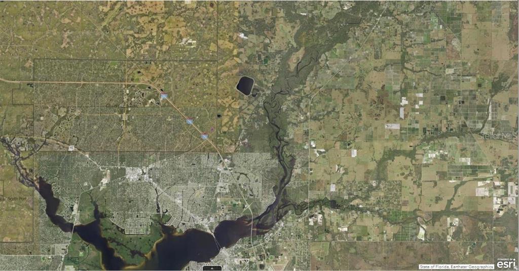 This aerial map shows the Myakka River winding through rural and residential areas in Florida — 1130220018 CHILE STREET, NORTH PORT, FL
