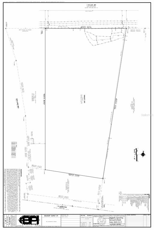 An aerial view shows a rectangular plot of land outlined in yellow next to a highway — 0 S MOON DRIVE, VENICE, FL