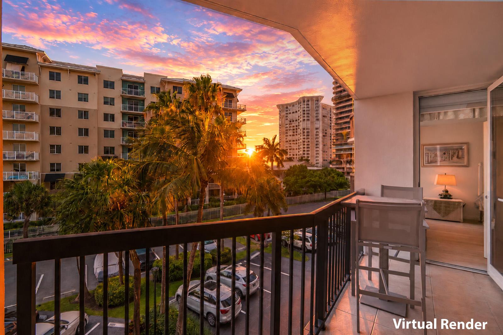 This virtual render shows a balcony overlooking a parking lot and buildings at sunset — 1361 S Ocean Boulevard # 303, Pompano Beach FL 33062, POMPANO BEACH, FL