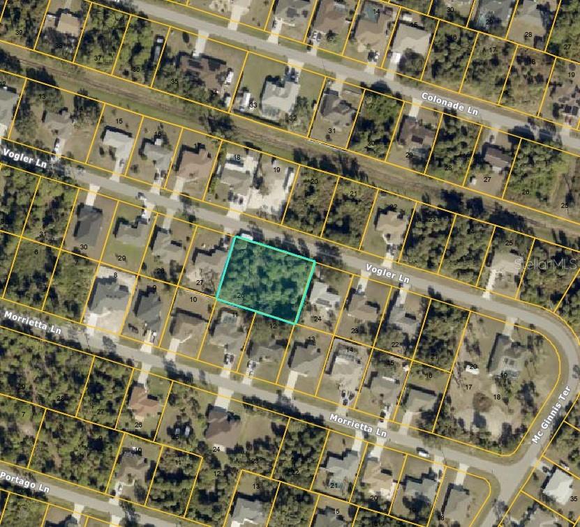 An aerial map view shows a vacant, wooded residential lot outlined in teal on a street — VOGLER LANE, NORTH PORT, FL