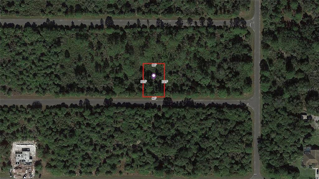 An aerial map view shows a rectangular plot of land outlined in red — 14228 NEVADA AVENUE, PORT CHARLOTTE, FL