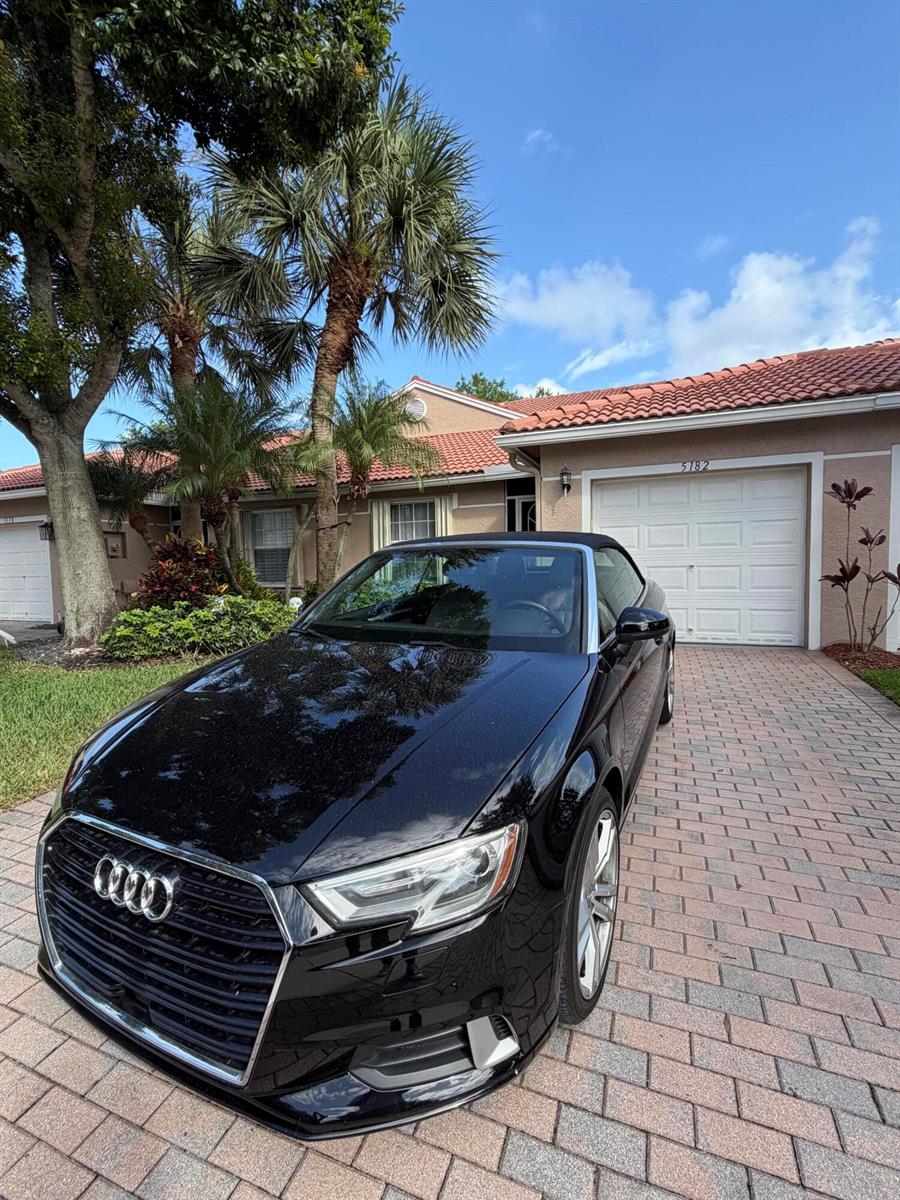 A black Audi convertible is parked on a brick driveway in front of a house — 5182 Toscana Trail, Boynton Beach FL 33437, BOYNTON BEACH, FL