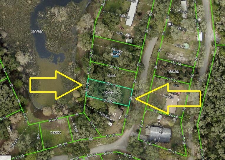 This is a property tax map showing parcel boundaries and dimensions overlaid on an aerial view — 3221 DUBLIN ROAD, DADE CITY, FL