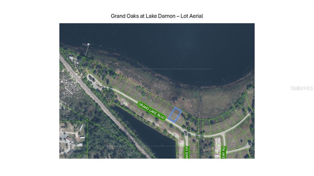 This aerial map shows a residential lot highlighted in blue along Grand Lake Boulevard — 970 GRAND LAKE BOULEVARD, AVON PARK, FL