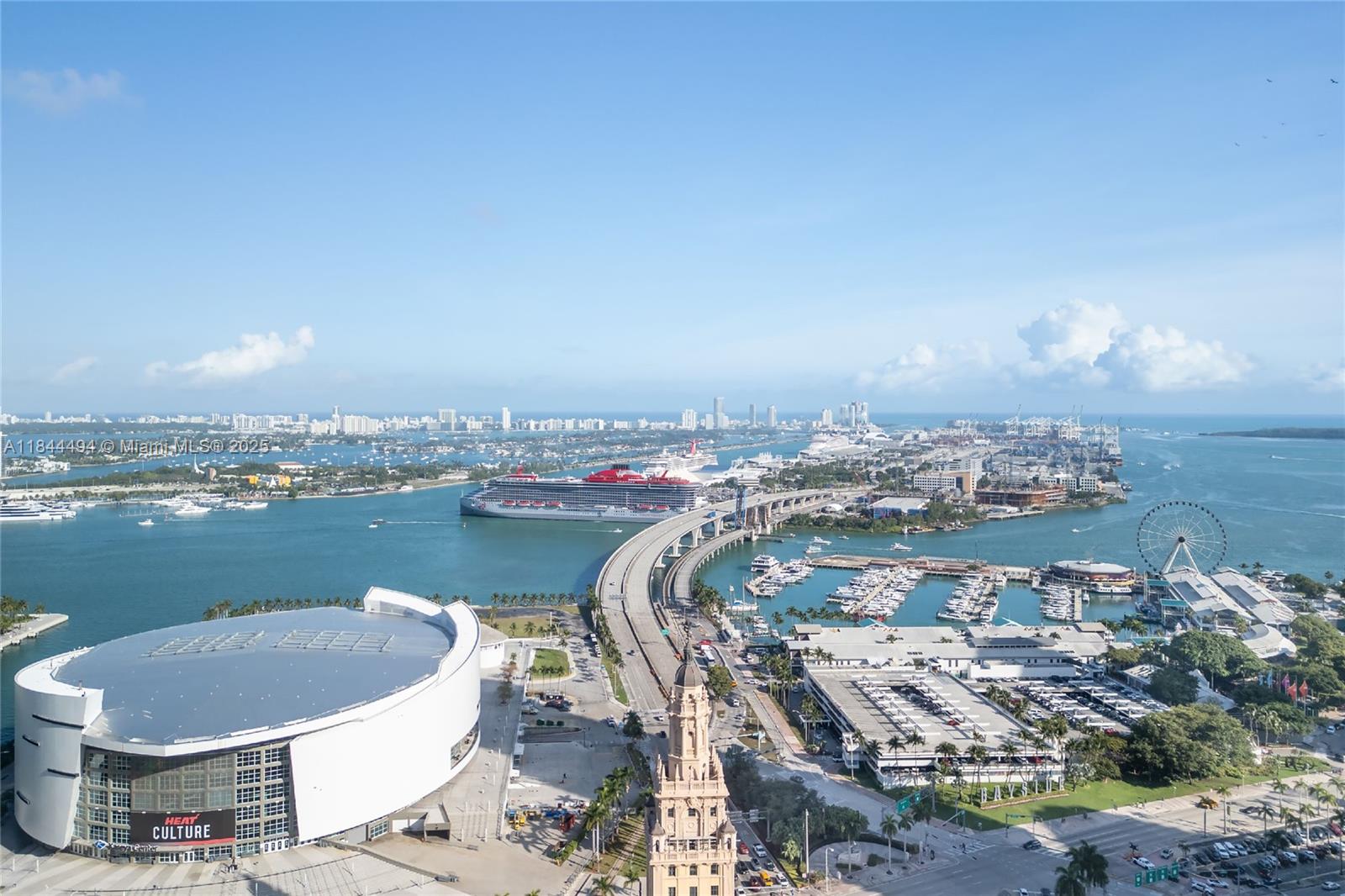 An aerial view shows the Kaseya Center, Freedom Tower, and a cruise ship in Miami — 601 NE 1st Av # 4402, Miami FL 33132, MIAMI, FL