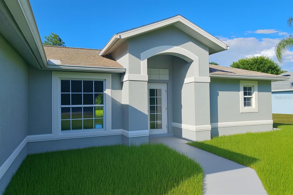 This is a digital rendering of the exterior of a single-story gray stucco house — 116 RIDGEMONT DRIVE, LEHIGH ACRES, FL