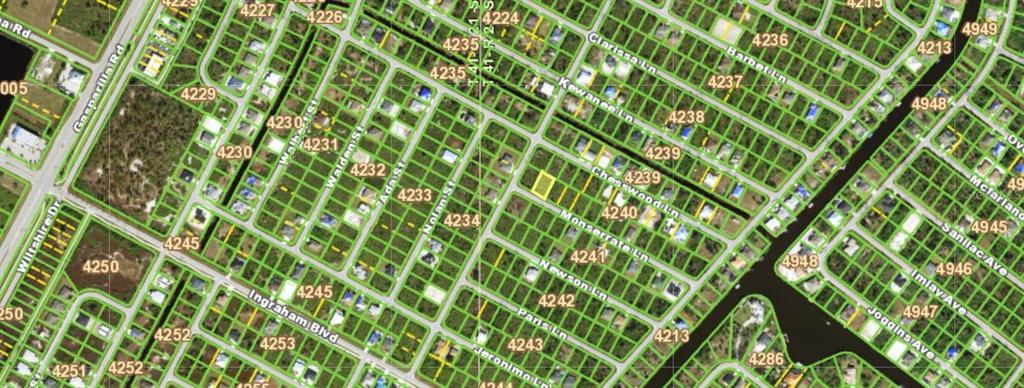 This is an aerial map showing a residential neighborhood with outlined property lots and streets — 14032 MONSERRATE LANE, PORT CHARLOTTE, FL