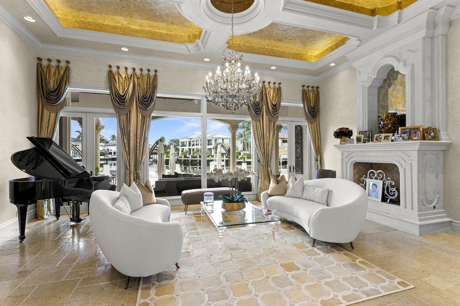 A formal living room features a grand piano, white curved sofas, and a gold-leaf ceiling — 3131 NE 27th Avenue, Lighthouse Point FL 33064, LIGHTHOUSE POINT, FL