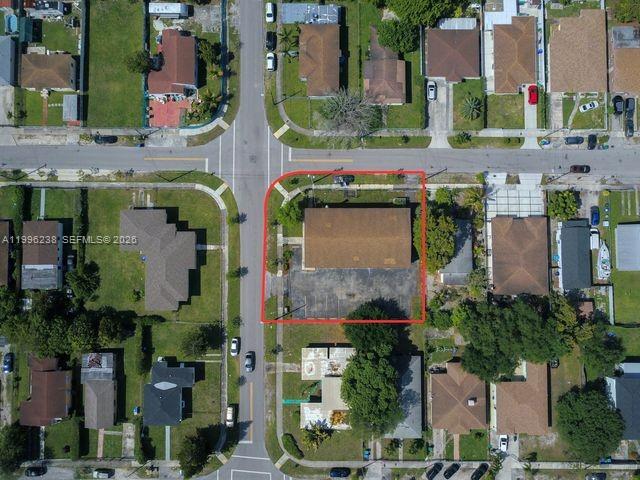 This is an aerial map view of a commercial property outlined in red — 6891 NW 13th Ave, Miami FL 33147, MIAMI, FL