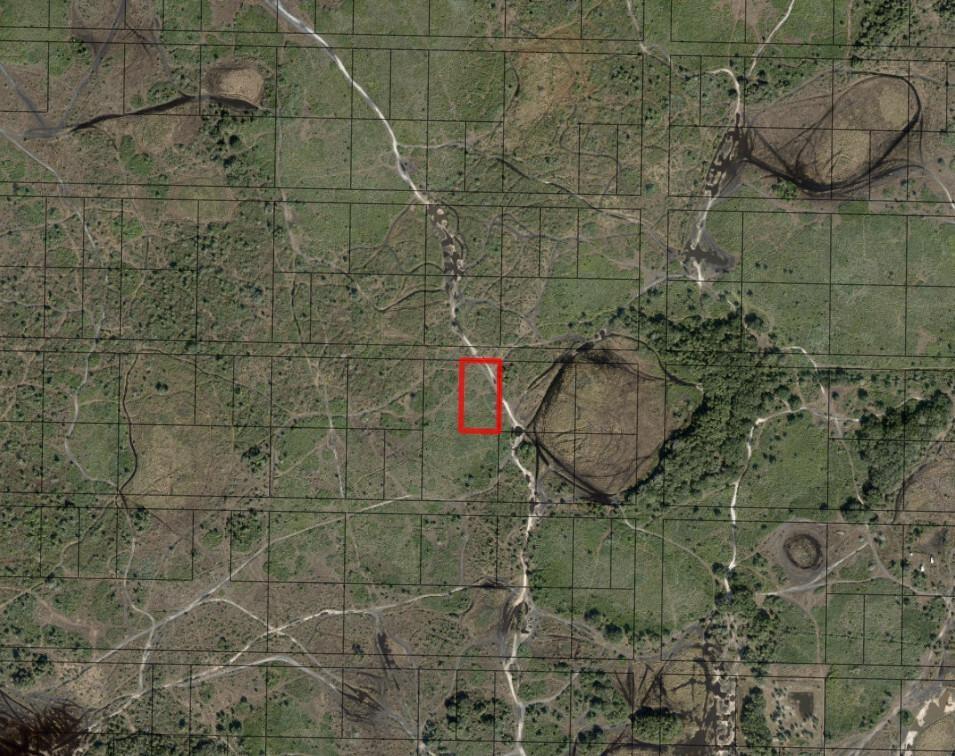 This is an aerial map showing a rectangular plot of land highlighted in red — 0 NW 312th Street, Okeechobee FL 34972, OKEECHOBEE, FL