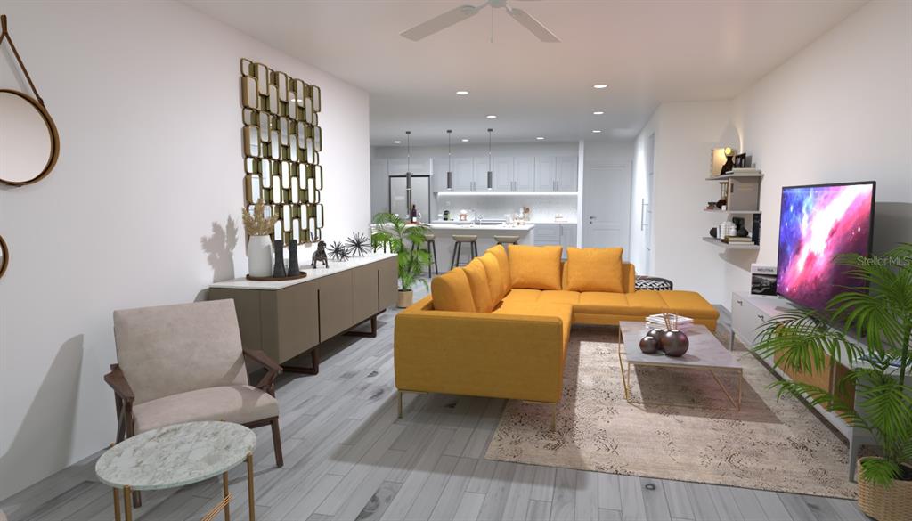 This is a rendering of an open-concept living room featuring a yellow sectional sofa — 2663 TRAFALGAR BOULEVARD, KISSIMMEE, FL