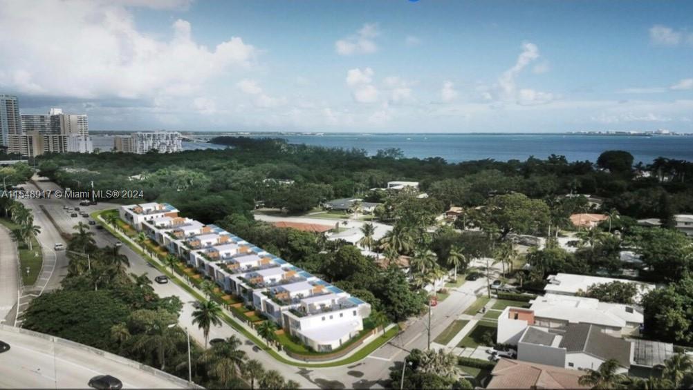 This is a rendering of a modern multi-unit residential complex near a coastal area — 2900 S Miami Ave, Miami FL 33129, MIAMI, FL
