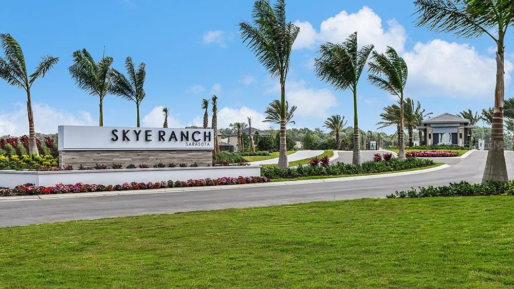 A large white sign for Skye Ranch Sarasota stands at the entrance of a community — 10141 MILKY WAY CIRCLE, SARASOTA, FL