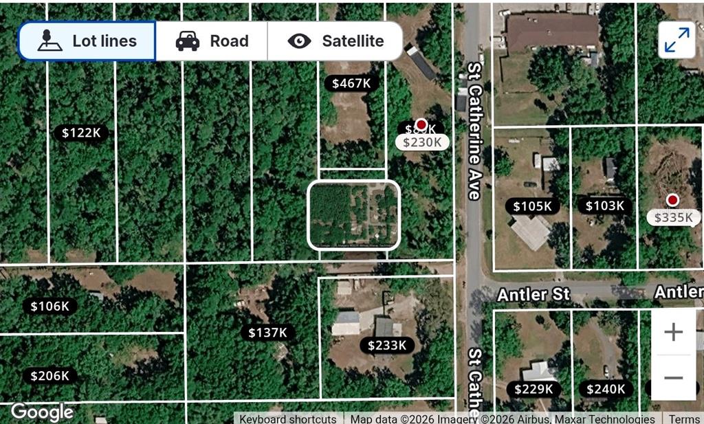 This is a satellite map view showing property lot lines and real estate price tags — 792 ST CATHERINE AVENUE, CHRISTMAS, FL