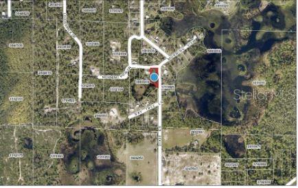 This is an aerial map showing a highlighted property lot located near a road and lake — MORNING VIEW DRIVE, PAISLEY, FL