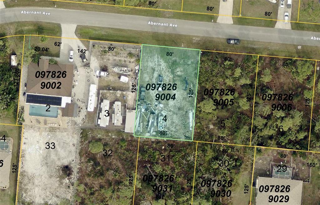 This is an aerial map showing a highlighted rectangular residential lot among neighboring properties — Lot 4 ABERNANT AVENUE, NORTH PORT, FL
