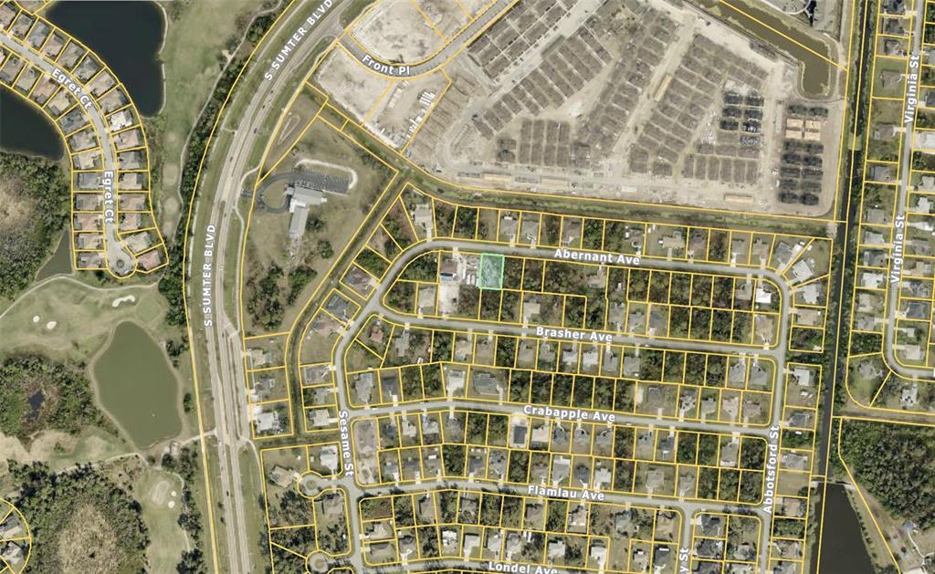 This is an aerial map showing a residential neighborhood with a highlighted vacant lot — Lot 4 ABERNANT AVENUE, NORTH PORT, FL