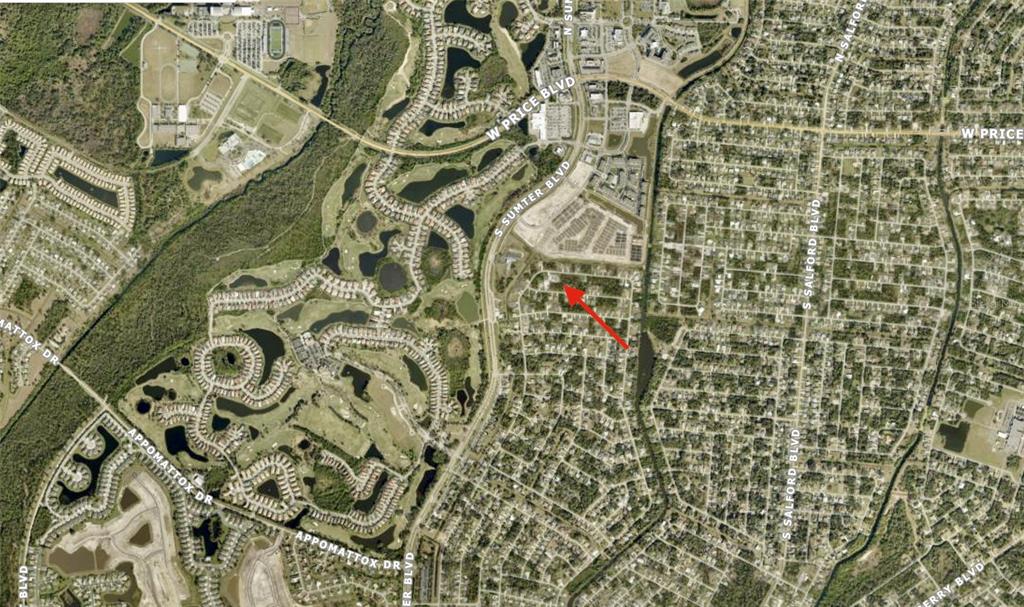 This is an aerial map view showing a residential neighborhood with a red arrow pointing to a specific lot — Lot 4 ABERNANT AVENUE, NORTH PORT, FL