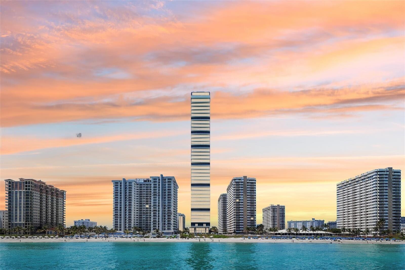 A tall, slender skyscraper stands on a beach in front of other residential buildings — 2000 S Ocean Drive SE # 5a, Hallandale Beach FL 33009, HALLANDALE BEACH, FL