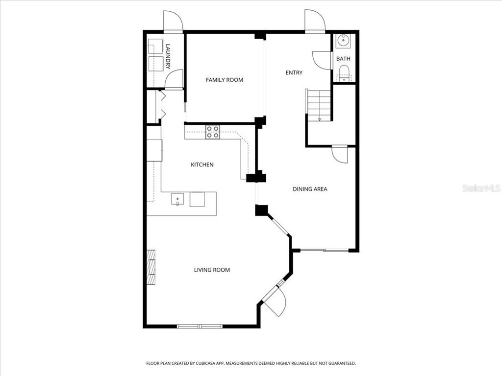 This is a floor plan of a home's main level featuring a kitchen, living area — 3271 TITANIC CIRCLE UNIT 39, INDIALANTIC, FL