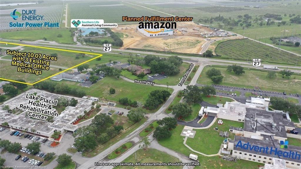 This aerial view shows a 10.07-acre property with three medical office buildings near a highway — 1346 US 27 HIGHWAY N, LAKE PLACID, FL