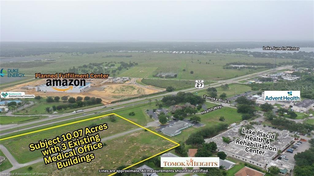 This aerial view shows a 10.07-acre property with three medical office buildings near a highway — 1346 US 27 HIGHWAY N, LAKE PLACID, FL