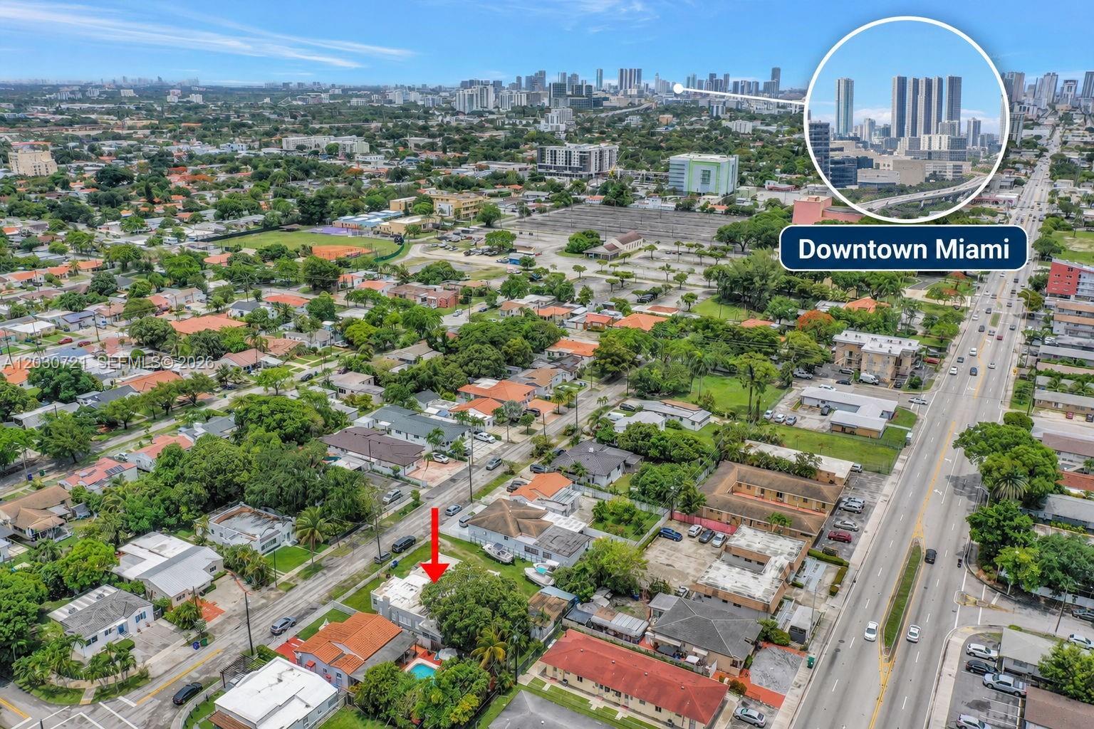 An aerial view shows a residential neighborhood with a red arrow pointing to a house — 3078 NW Flagler Ter, Miami FL 33125, MIAMI, FL