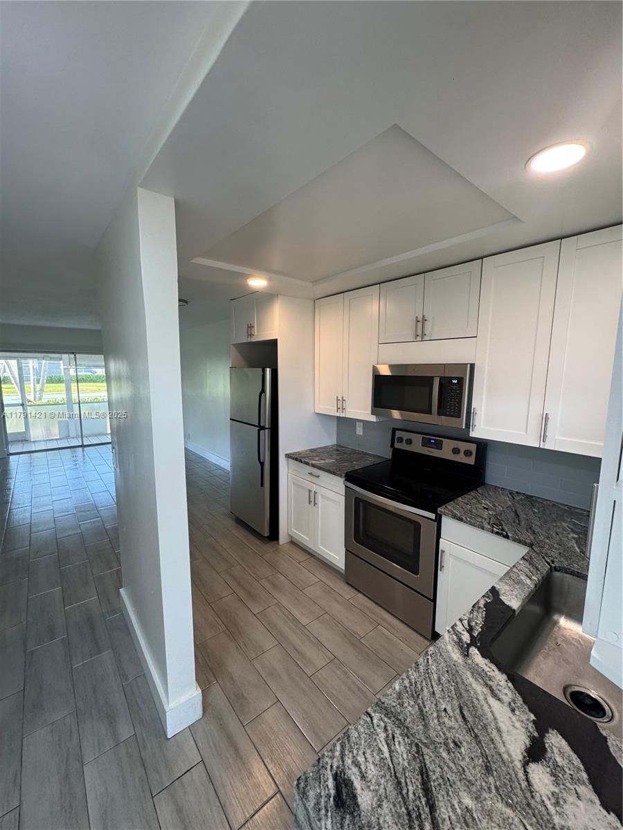 9851 Sandalfoot Blvd # 208, Boca Raton FL 33428
