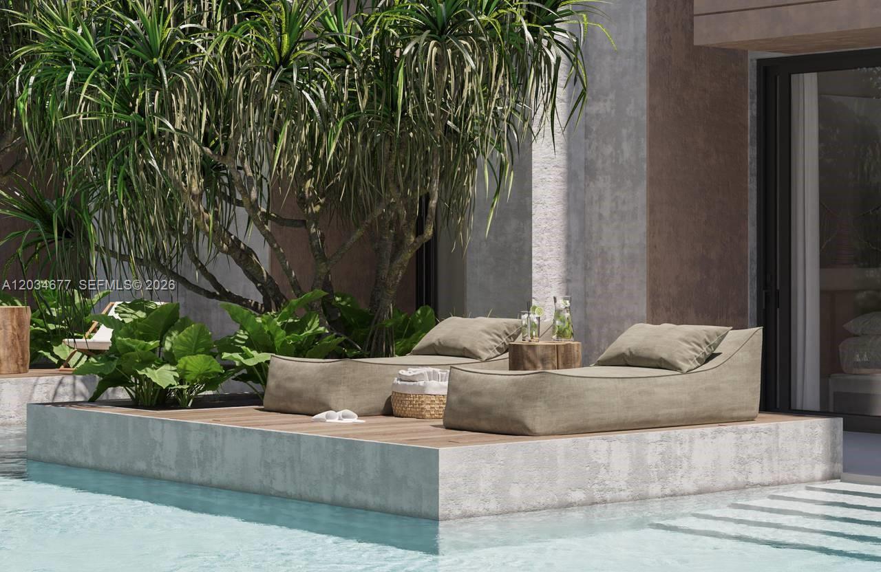 This is a rendering of a poolside deck featuring two lounge chairs and a tree — JJR6+692, Punta cana # 1, FL