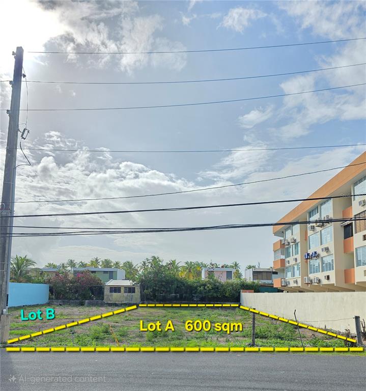 A vacant, rectangular plot of land is outlined in yellow against a residential background — 16 OCEAN DRIVE AVENUE LOT A, LUQUILLO, PR