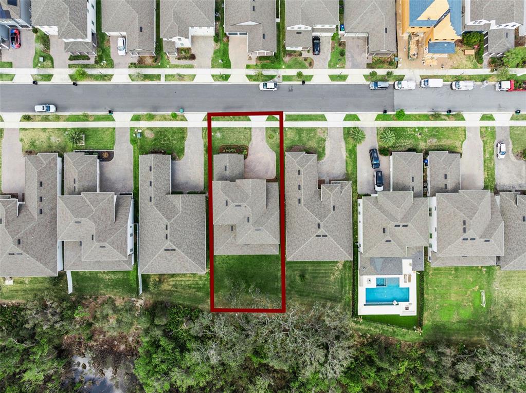 An aerial view shows a single-family home with a red outline on its lot — 17588 LAKE STAR ROAD, WINTER GARDEN, FL