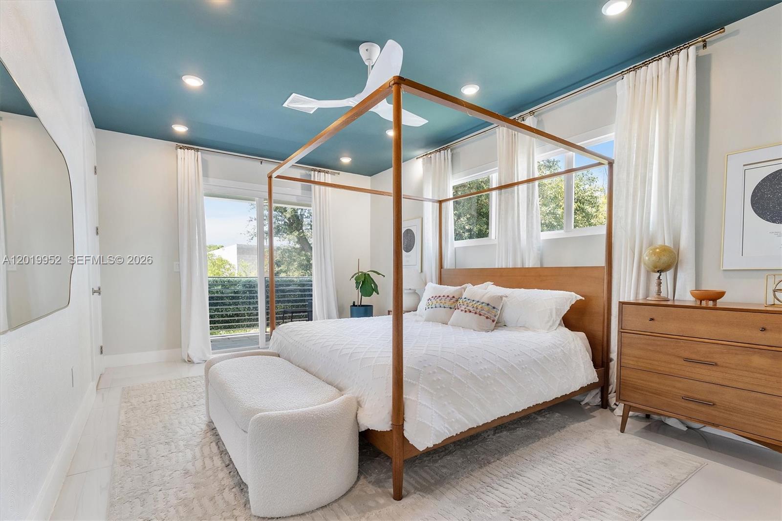 A bedroom features a four-poster wooden bed, a teal ceiling, and a white bench — 2920 SW 25th Ter # B, Miami FL 33133, MIAMI, FL