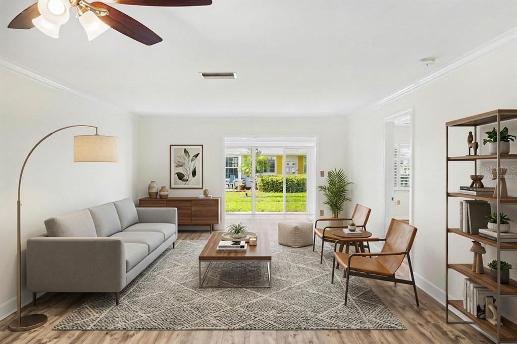 A single-story house features a white exterior, a covered carport, and a green front lawn — 4414 MOUNT VERNON DRIVE UNIT 0, BRADENTON, FL