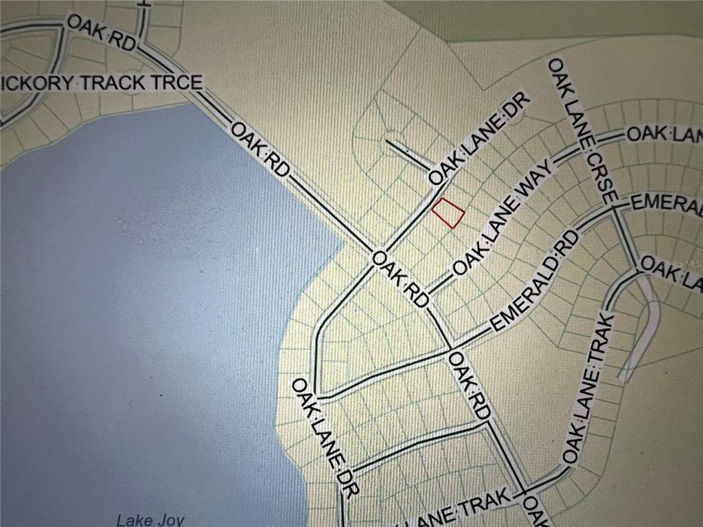 This is a map showing a residential area with a highlighted property lot — 293 OAK LANE DR., OCALA, FL
