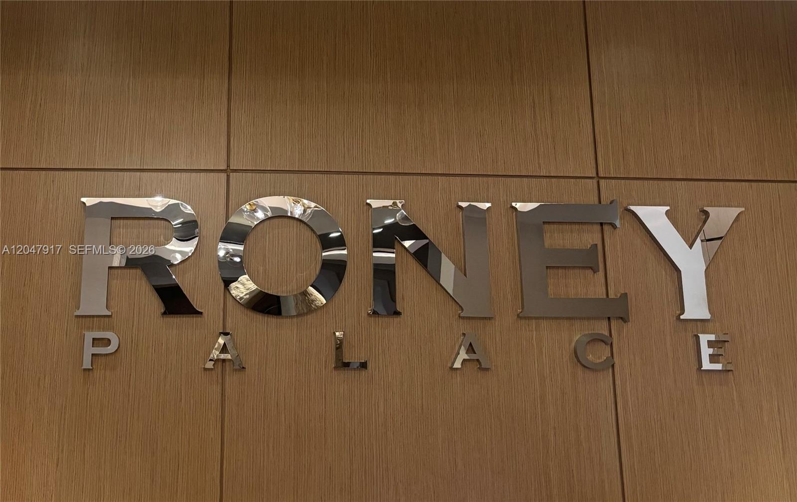 A wall features large, reflective, metallic letters spelling out Roney Palace — 2301 Collins Ave # 833, Miami Beach FL 33139, MIAMI BEACH, FL