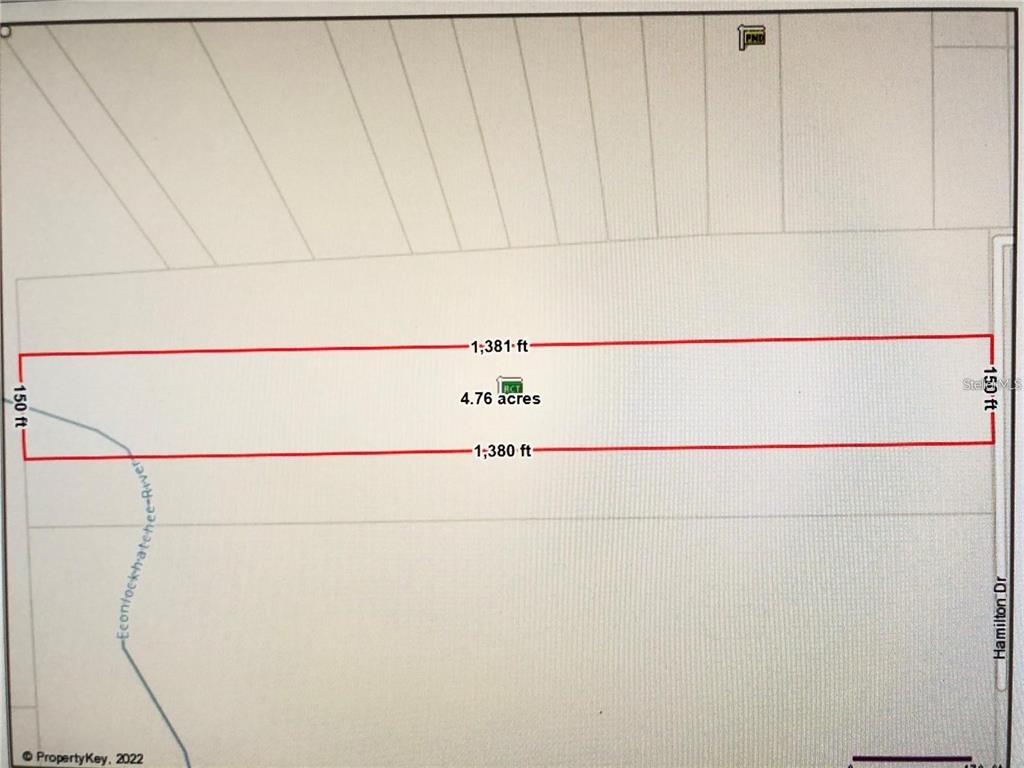 This is a property map showing a rectangular 4.76-acre parcel of land near a river — 848 HAMILTON DRIVE, ORLANDO, FL