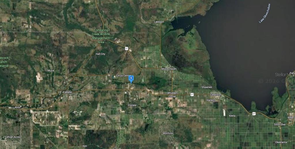 This is a satellite map showing the area surrounding Citrus Center in Florida — 1095 RIGHT SIDE ROAD, MOORE HAVEN, FL
