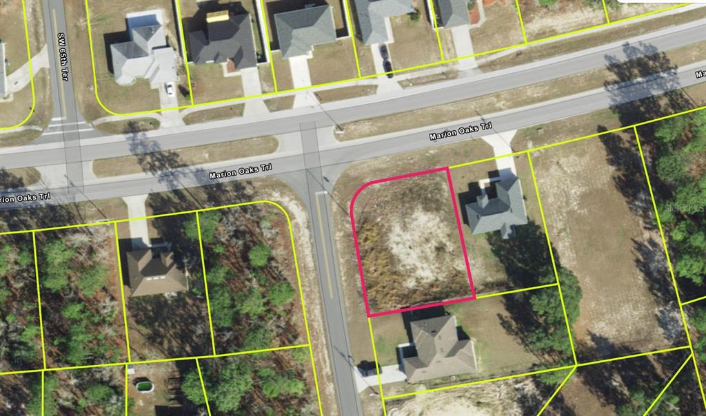 This is an aerial map showing a vacant residential lot outlined in pink — LOT 29 MARION OAKS TRAIL, OCALA, FL