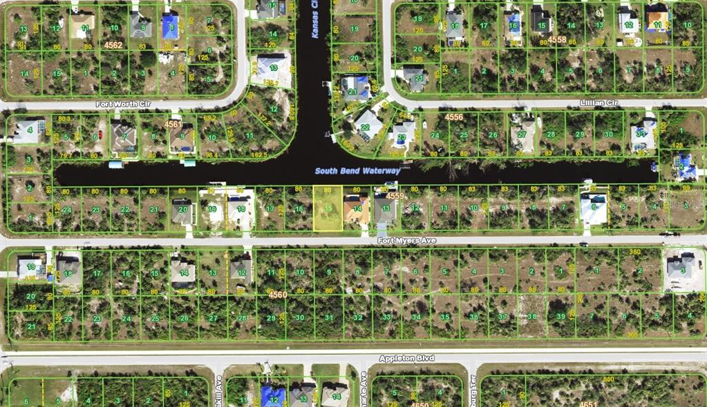 This is an aerial map showing residential lots and a waterway in a suburban neighborhood — 14264 FORT MYERS AVENUE, PORT CHARLOTTE, FL